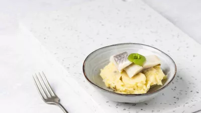 Preistoemp met Vlaamse opgelegde zure haring